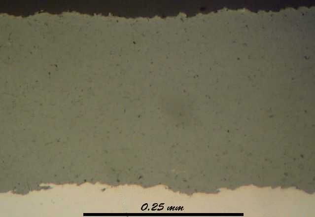 Photomicrograph of Plasma Sprayed Chromium Oxide Coating X250